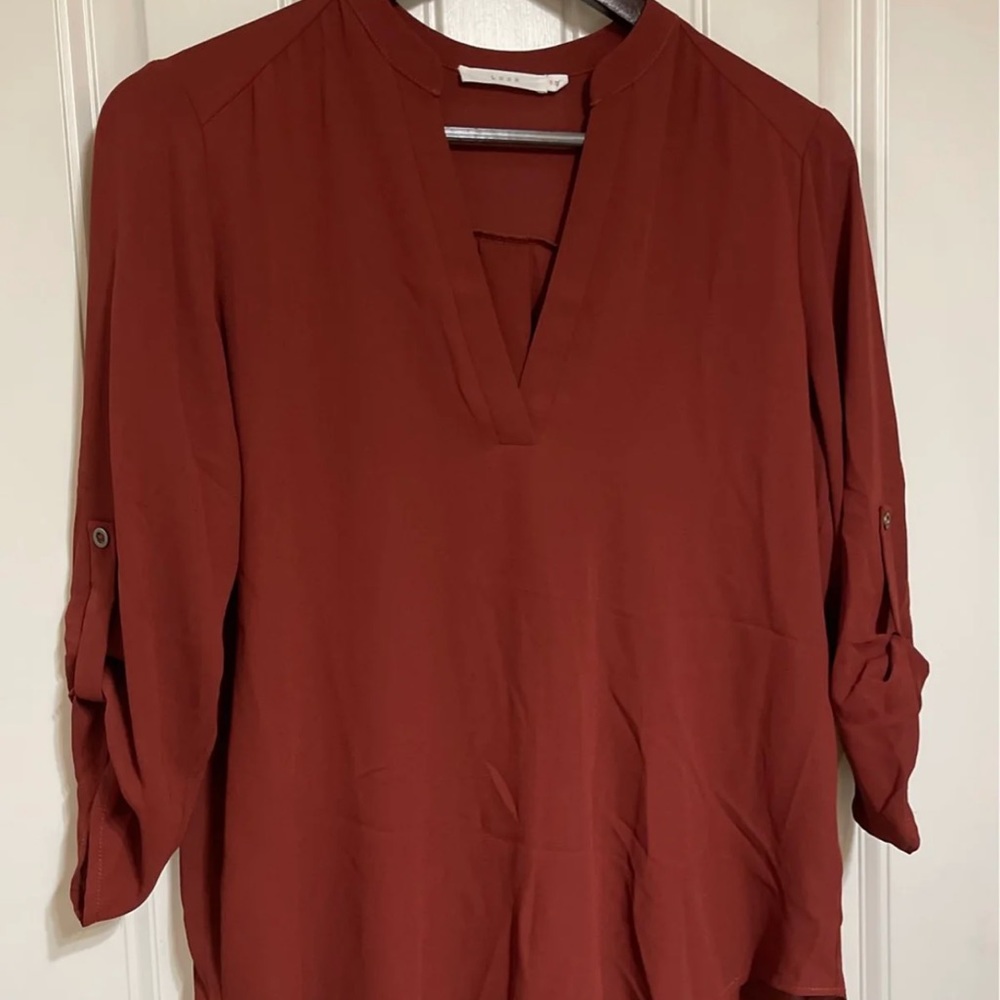 Boutique top rust colored size S but fits like a Med